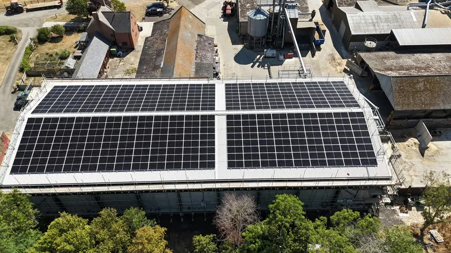 A 219 kWp rooftop solar array across the barns of a working farm in south Warwickshire